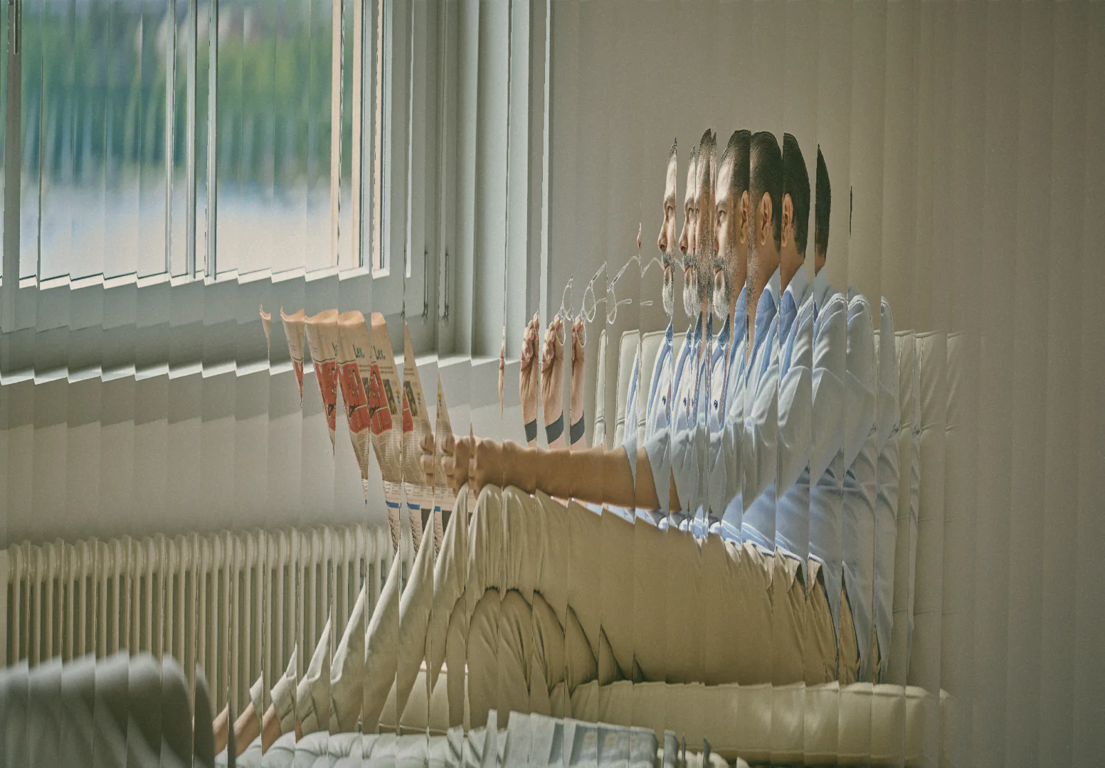 Two people sitting by a window, seen through a stepped photographic effect
